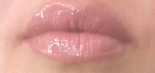 XOXO Liquid Lips ~ a sheer light pink gloss.