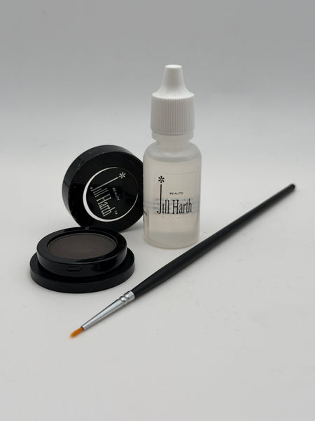 Charcoal Cake Eyeliner comes with a Thin Liner Brush and Sealer solution